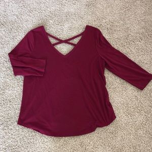 Burgundy V-neck shirt with detailed back